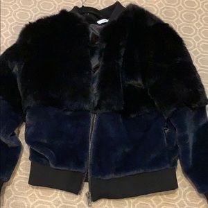 Never worn before fur jacket